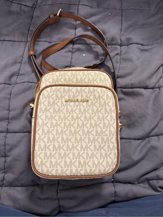 Michael Kors Handbags - Michael Kors Jet Set Travel Medium Logo Crossbody Bag in vanilla